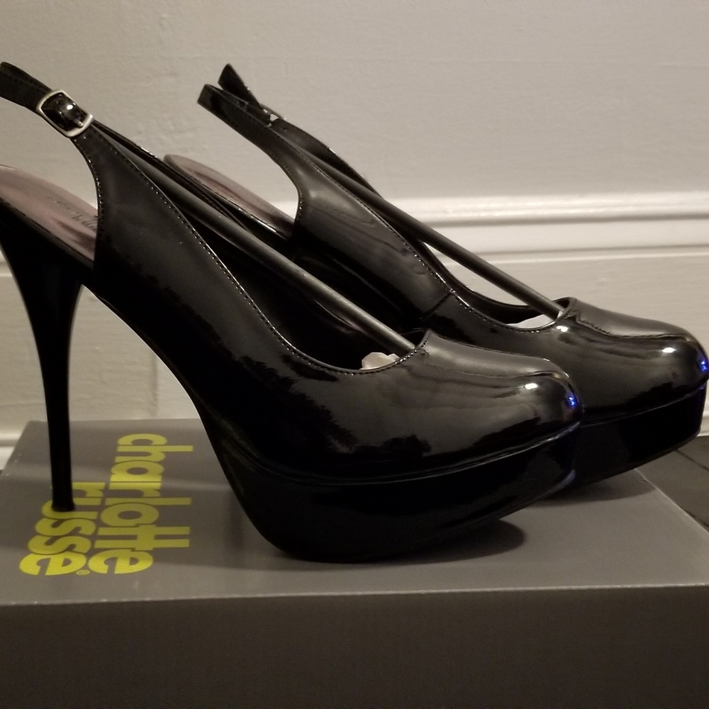 Black stiletto leather pumps